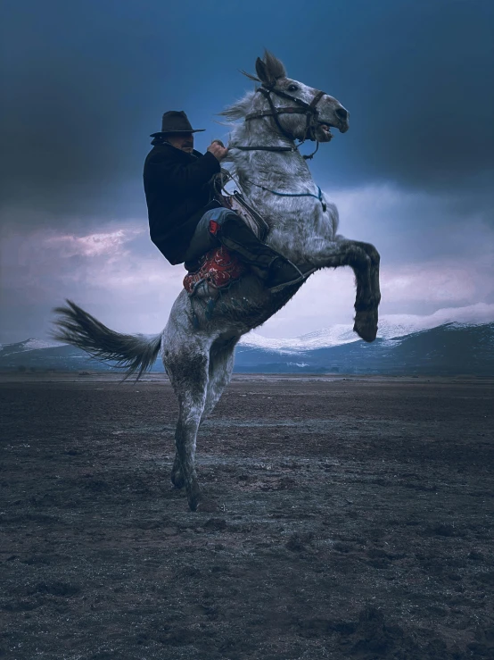 a man jumping a horse on the side of the road