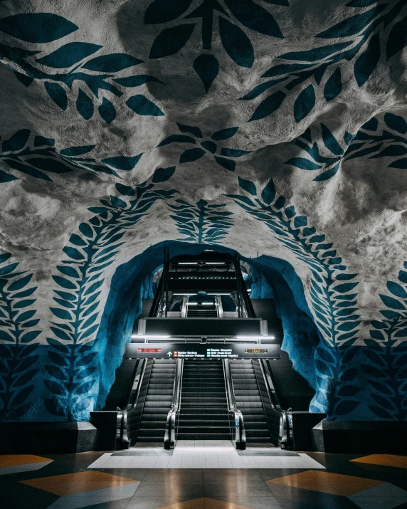 escalator with the light turned on and painted blue