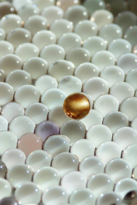 gold and white circles of marble on table