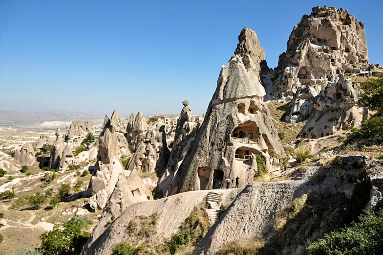 a rock formation with several small caves in it