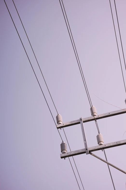 electric wires are shown with five lights above them