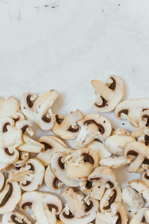 mushrooms on a counter waiting to be baked