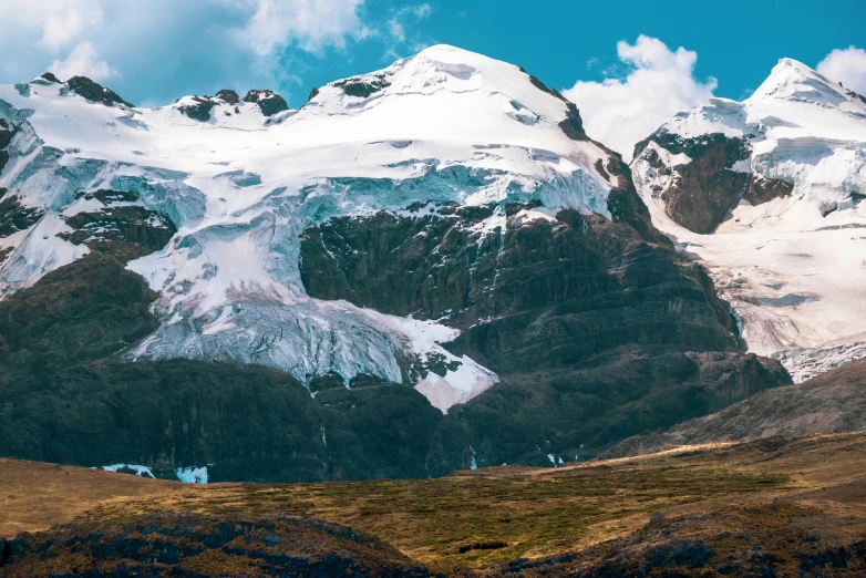 a mountain with some snow on it