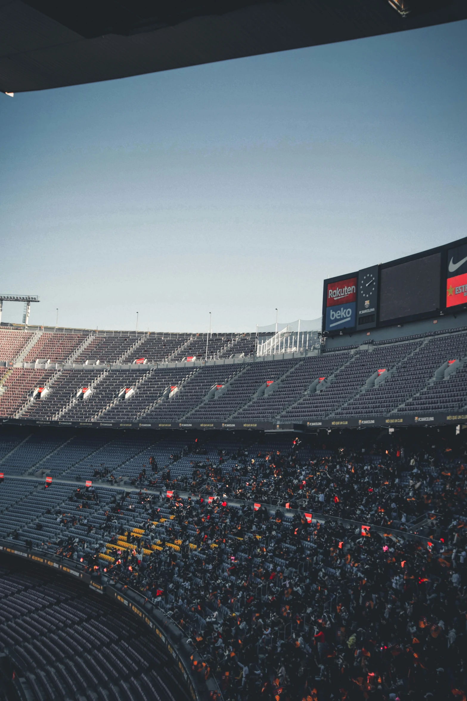 a stadium full of people watching and doing soing