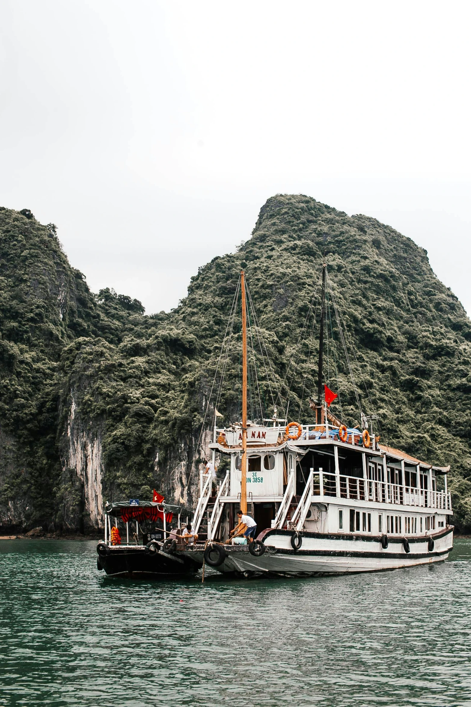 a group of small boats floating next to each other