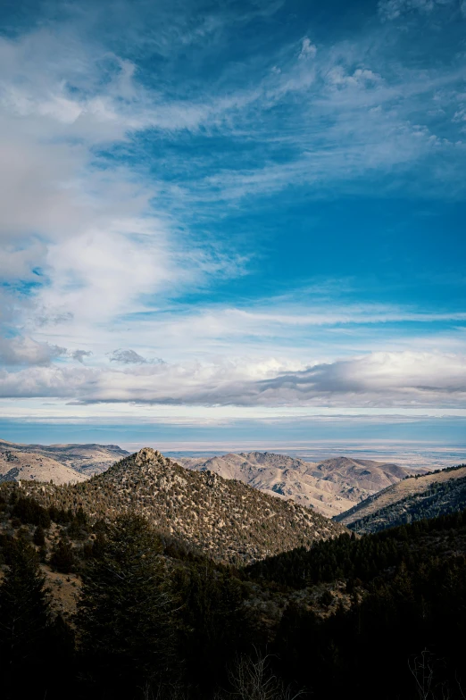 a scenic view over a valley in a distant area