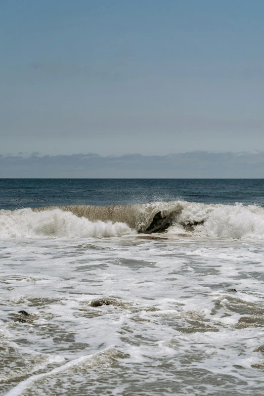 a person that is surfing in some water