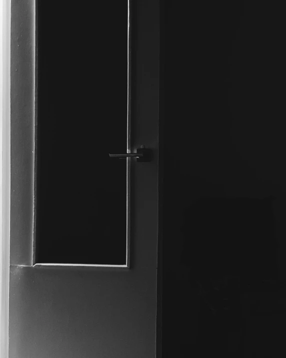 there is a black and white po of a door