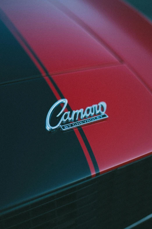 a red and black car with the word canyon painted on it