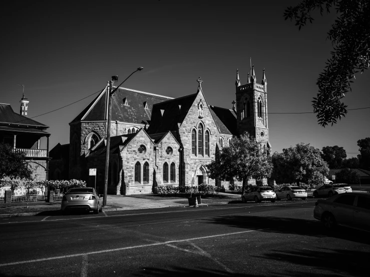 a church is shown on the corner of a street