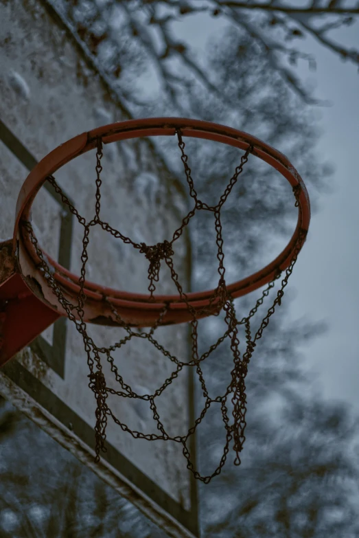 a basketball hoop that is broken in half