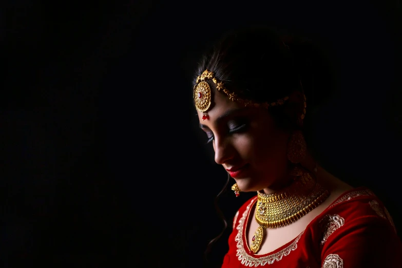 a close up of a person wearing jewellery