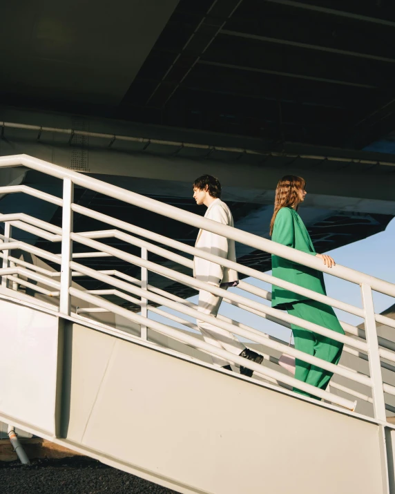 two women walking on deck of large boat