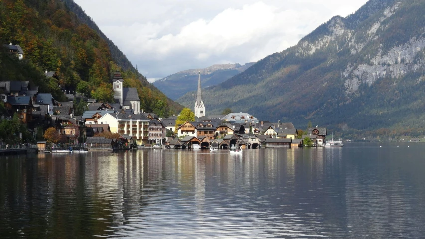 a town with buildings and houses near the water