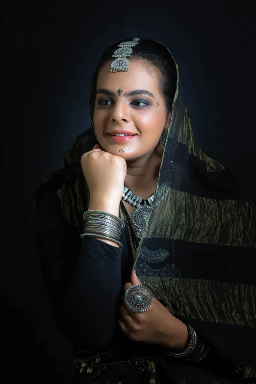 a woman with black and white clothing posing for the camera