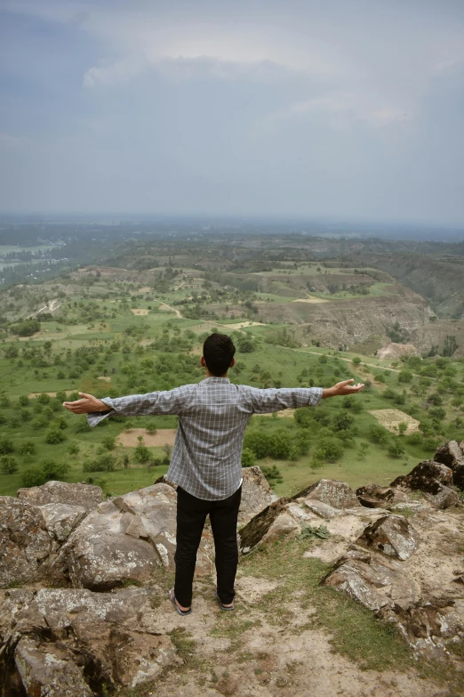 a person looking out over an open area