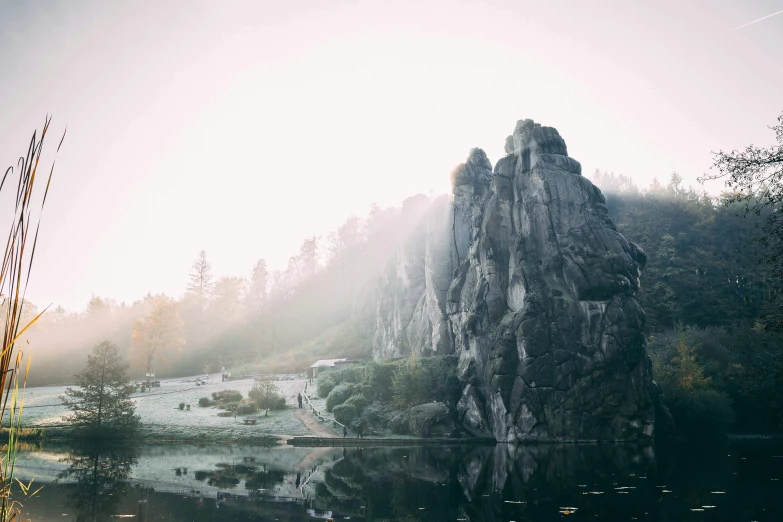 an overcast day in the woods and mountains