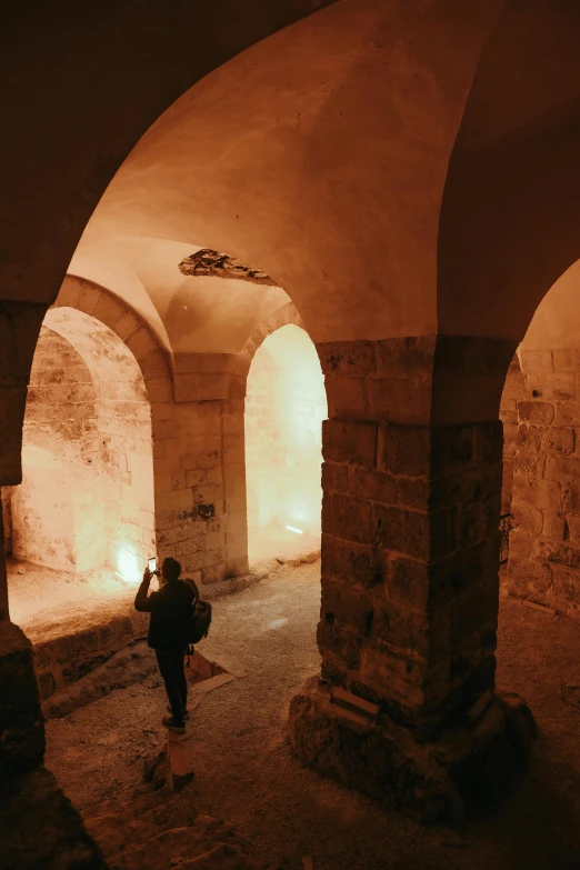 the inside of a tunnel with two arches