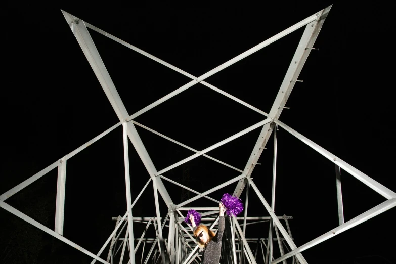 there is a female in an electrical tower