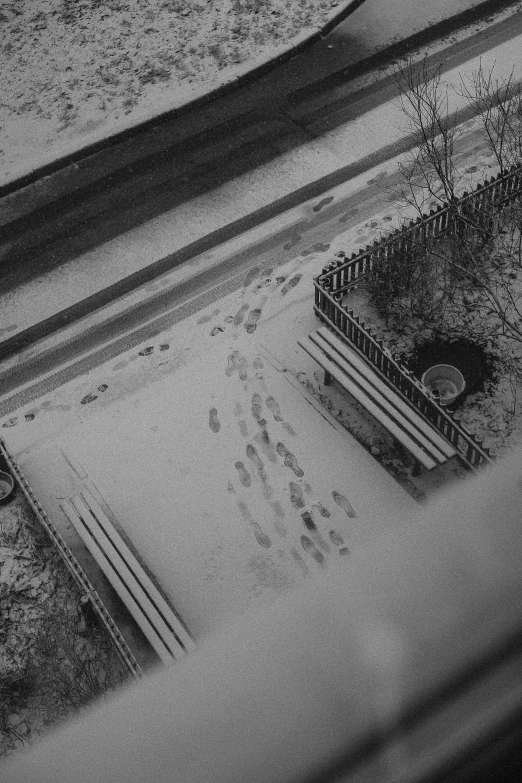 the view from a window looking out over snow covered fields