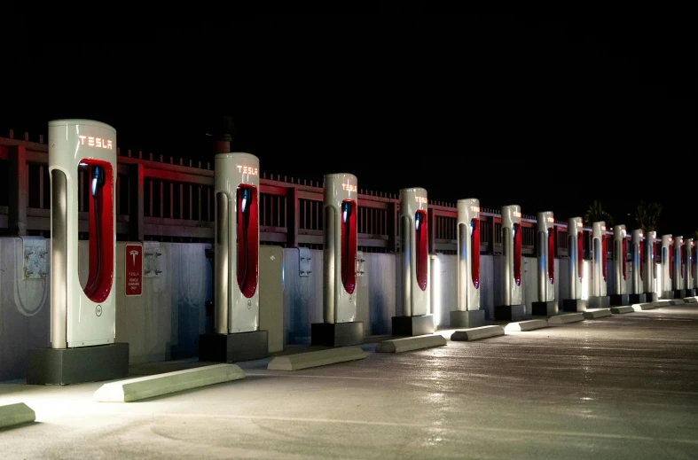 a row of white and red metal gates