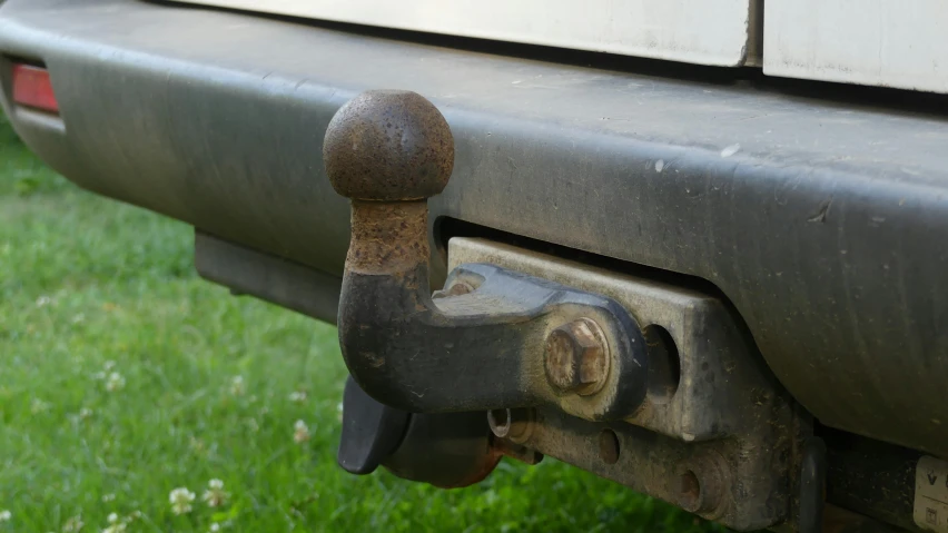 the metal handles on this truck have been painted brown