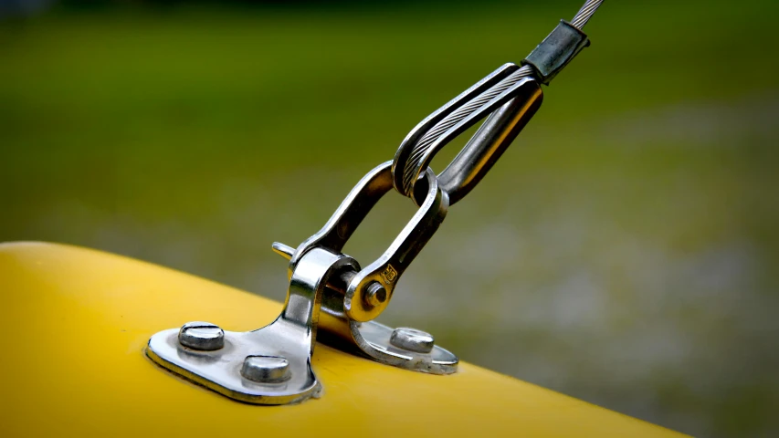 close up of scissors and a yellow background