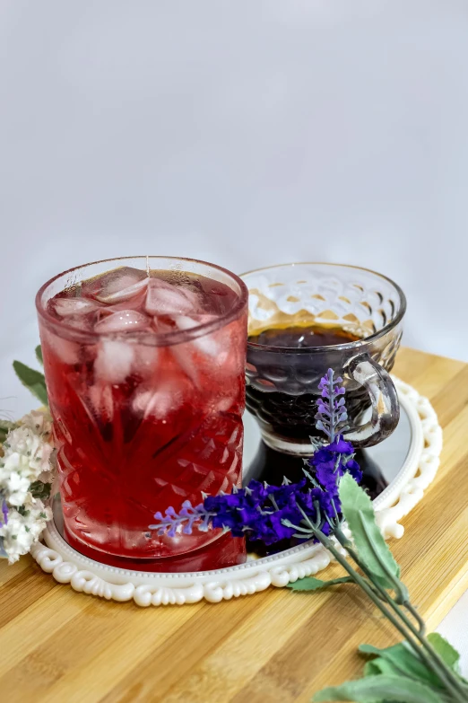 an image of a drink with flowers on a plate