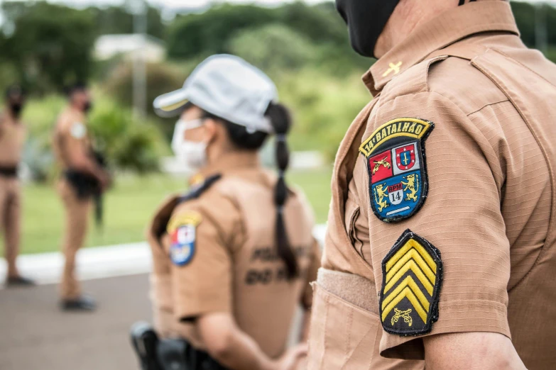 a police officer wearing badges on his uniform