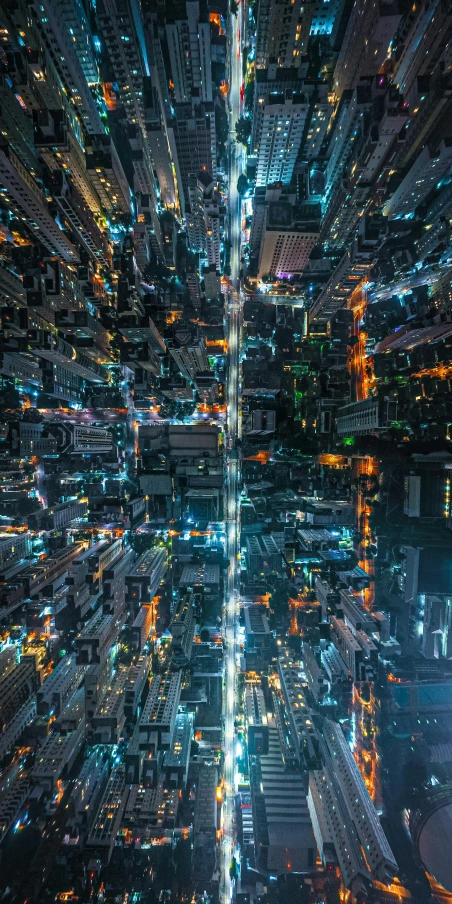 a very high view of the city of buildings and lights