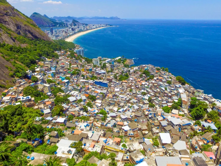 an aerial view of the sea and city