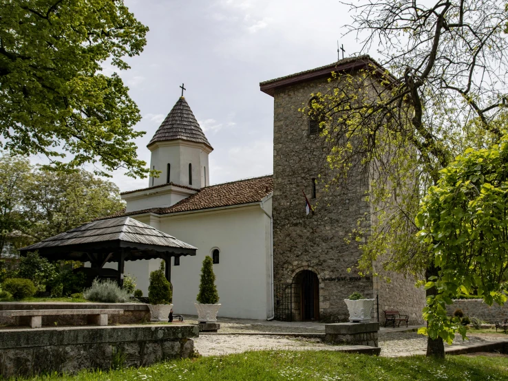 an old, stone church with a clock tower