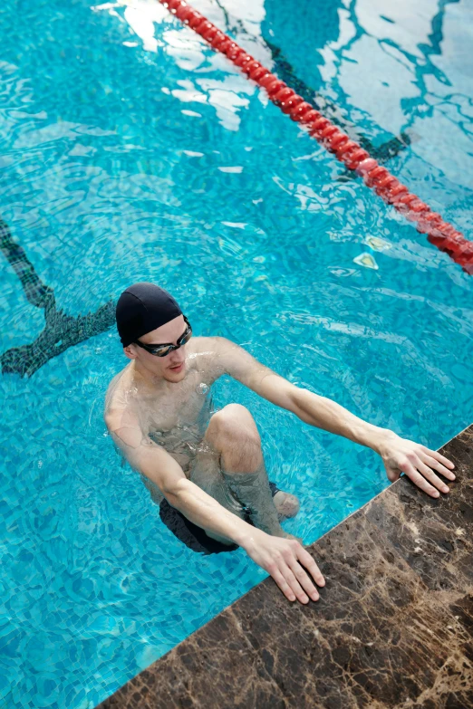 a person that is riding a skateboard in the water