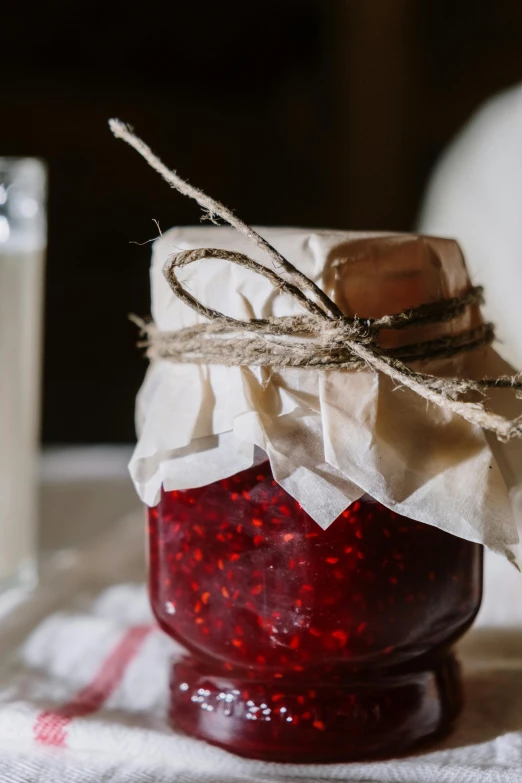 a glass container filled with liquid on top of a table