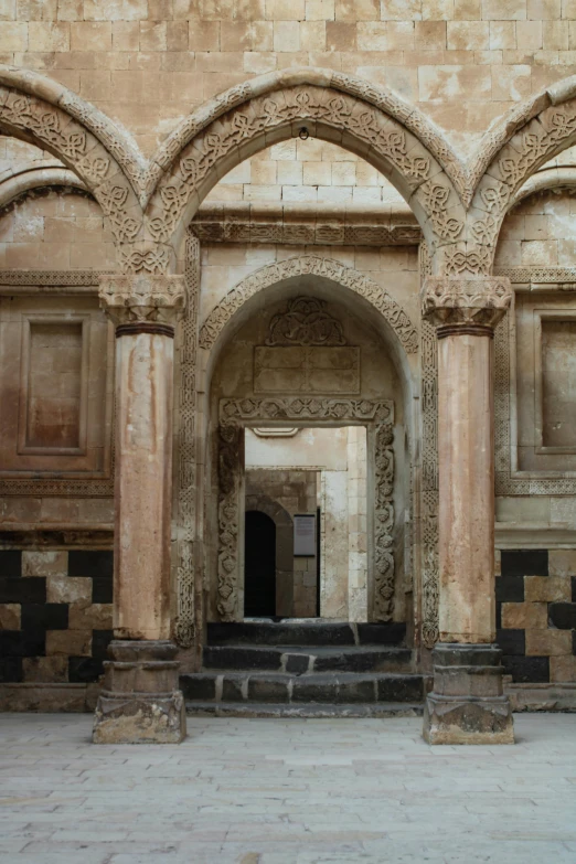 a very beautiful old building with arches