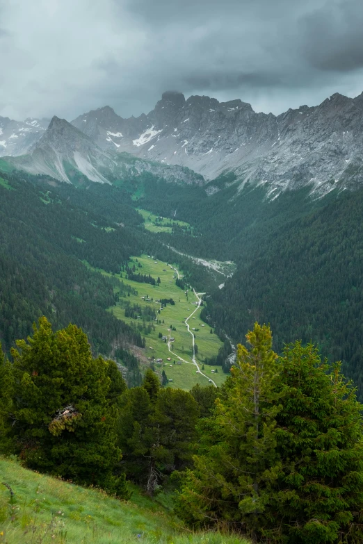 a scenic view of an area with many mountains