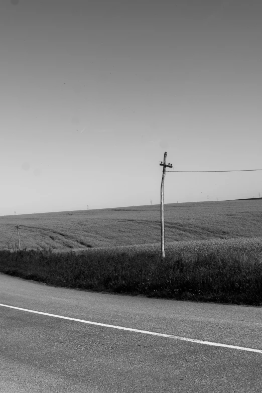 a black and white po of an empty road