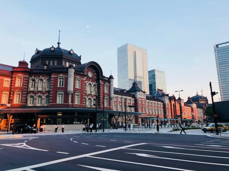 an old building with a tower in the background