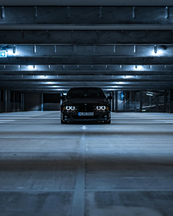 an open parking garage with an extended roof