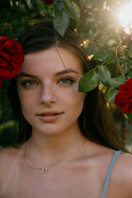 a  with long hair and roses in her hair