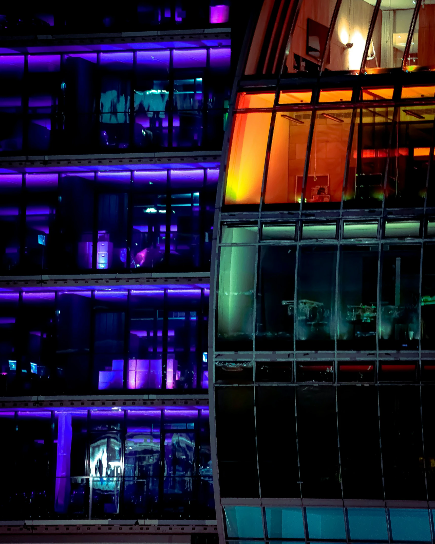 buildings lit up with bright lights and windows