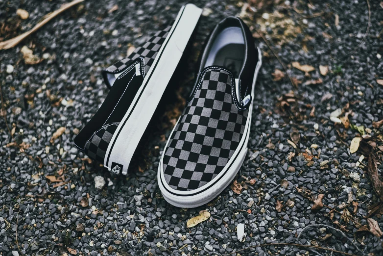 black and white checkered vans with white soles