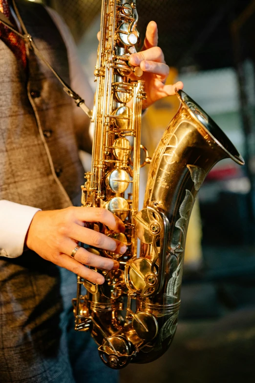 a close up of a saxophone being played