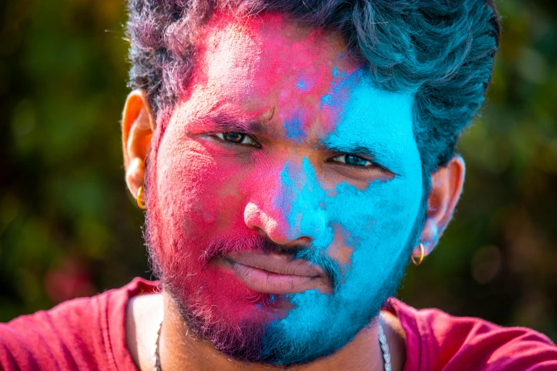 a man with different colors around his face