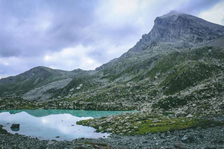 a mountain with a lake in front of it