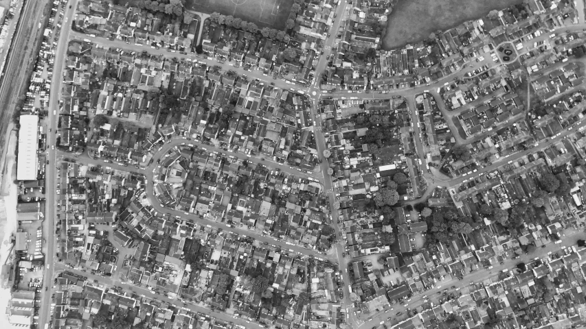aerial view of a residential neighborhood in black and white
