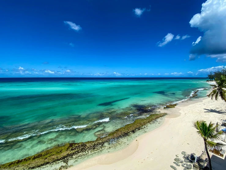 a view of the beach in front of the ocean