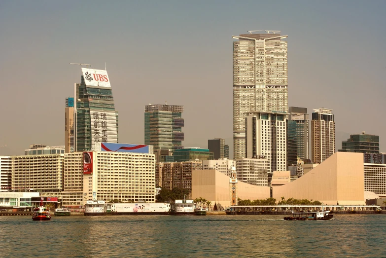 the skyline of a city with many tall buildings near it