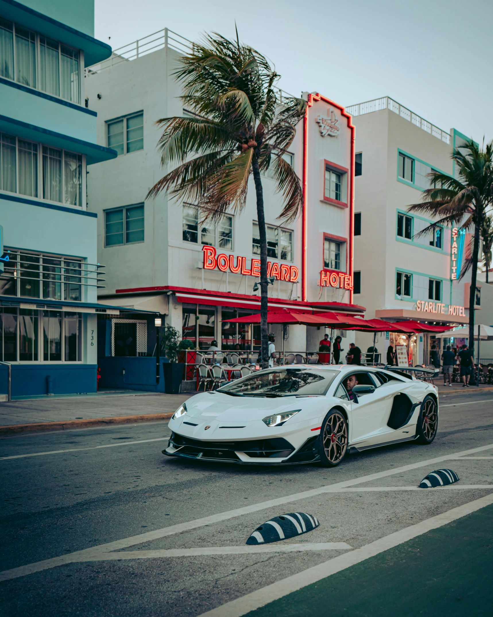 a very beautiful parked car on the road