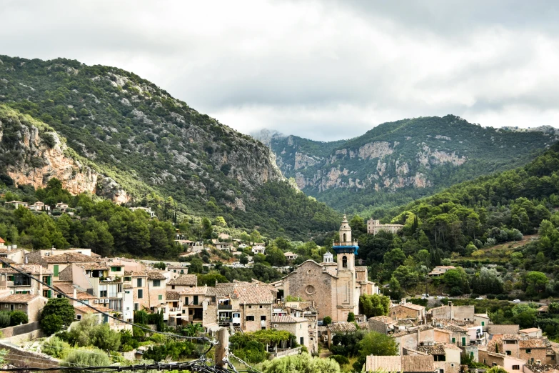 an old village nestled on the hill in italy